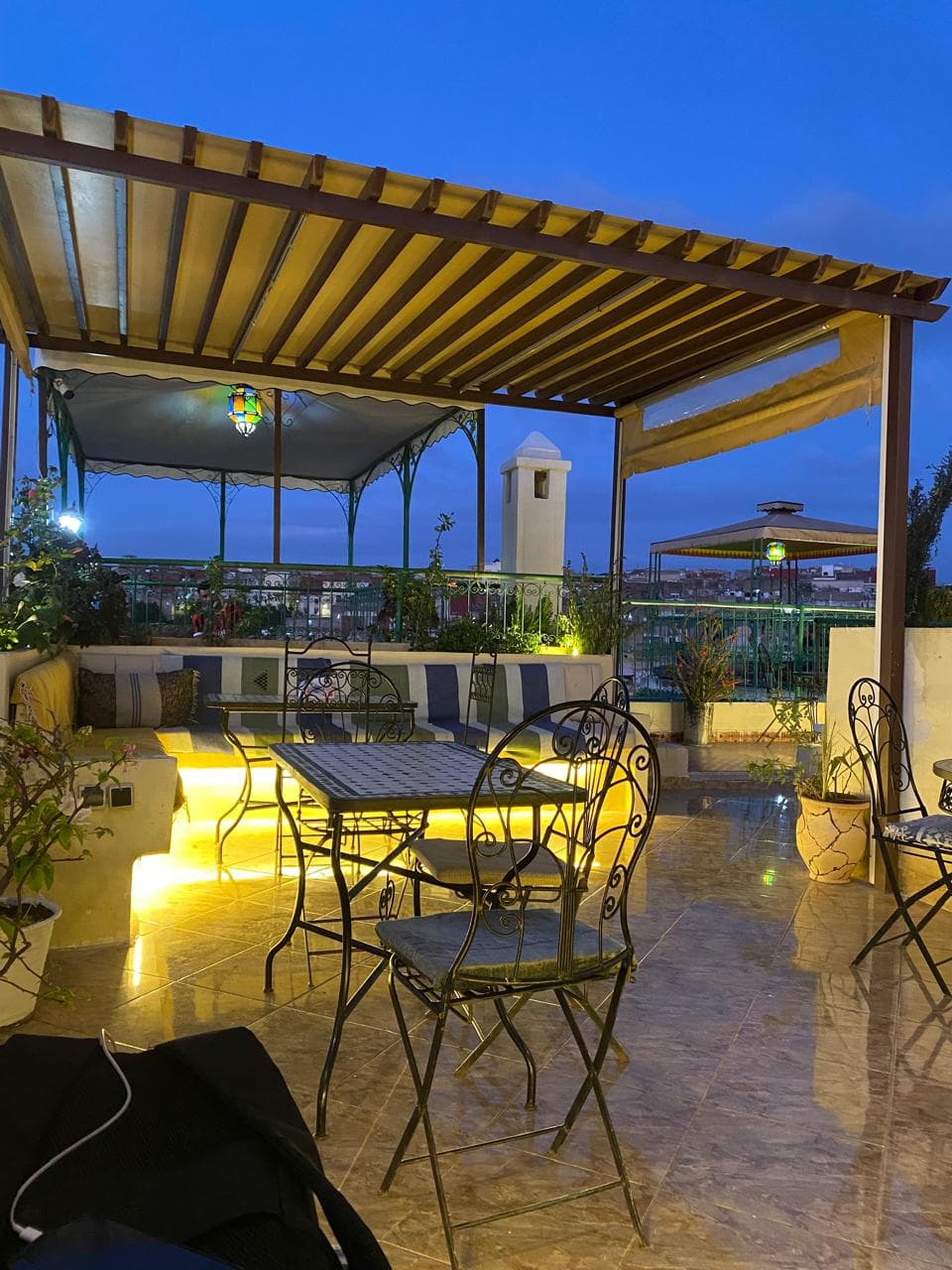 Rooftop dining terrace with panoramic views of Fes Medina at Benyamna Restaurant
