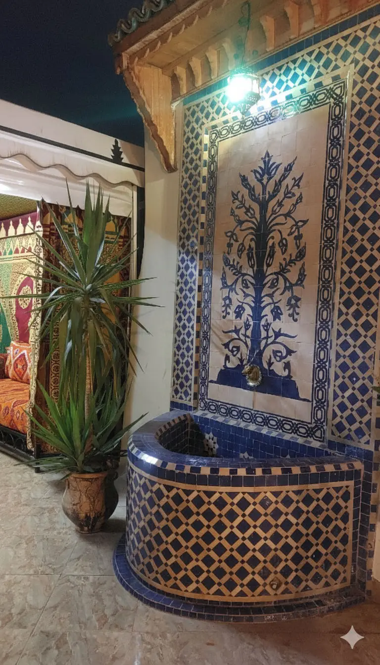 Traditional Moroccan Zellige Fountain and Decor on the Benyamna Restaurant Rooftop in Fez.