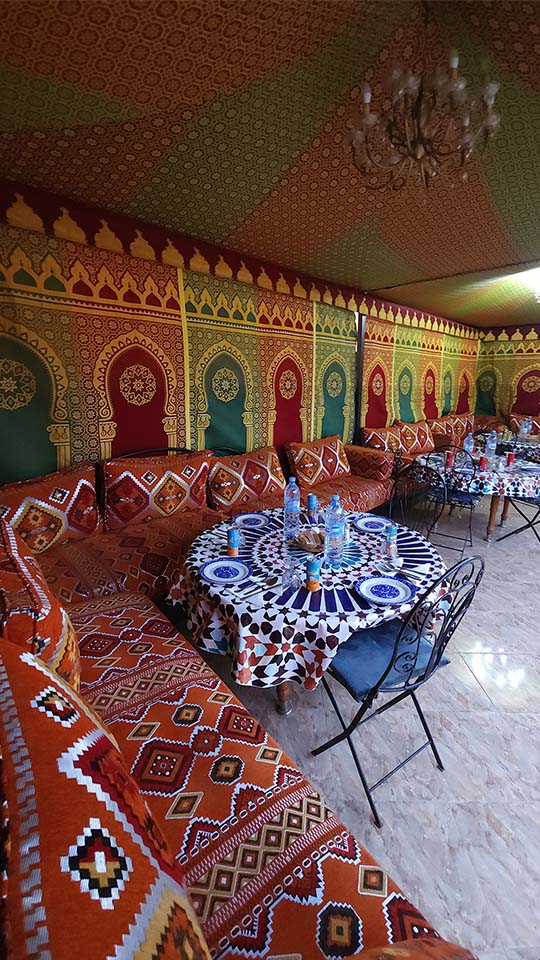 Dining area on the rooftop of Benyamna Restaurant Fes
