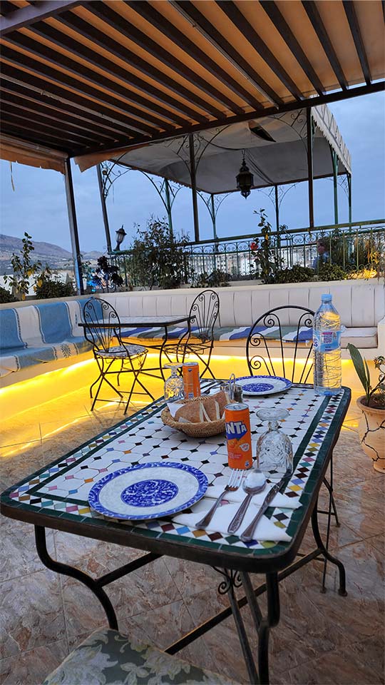 Night rooftop lights at Benyamna Restaurant Fes