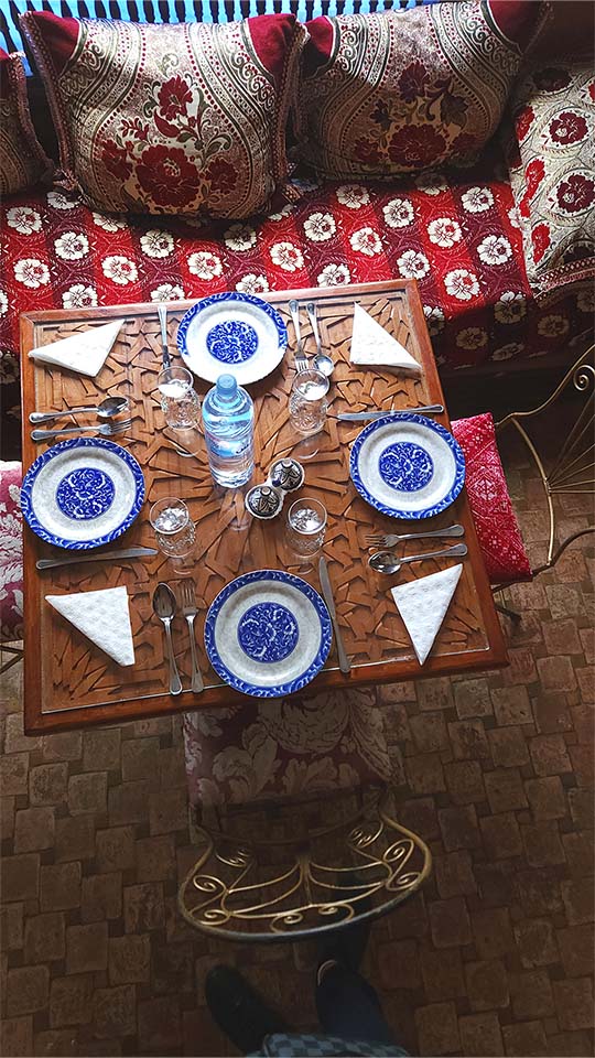 Seating arrangement on the second floor of Benyamna Restaurant in Fes